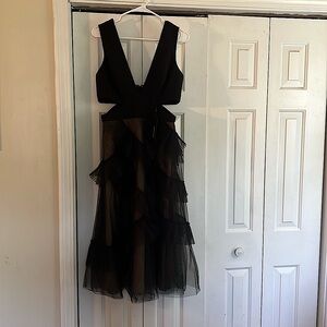 Chic and stylish black BCBGMaxAzaria formal dress.